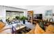 Inviting living room with ample natural light, comfortable seating, and stylish decor overlooking the yard at 2900 Cove Cay Dr # 1B, Clearwater, FL 33760