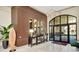 Elegant lobby with stylish decor, decorative mirrors, and modern lighting at 29823 Ganga Way, Wesley Chapel, FL 33543