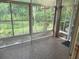 Enclosed patio showing tranquil views of the outdoor space at 29823 Ganga Way, Wesley Chapel, FL 33543