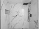 Modern bathroom features tiled shower with rainfall shower head and built-in niche at 3139 Elkridge Dr, Holiday, FL 34691