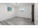 Neutral bedroom offers new floors and paint with lots of natural light at 3139 Elkridge Dr, Holiday, FL 34691