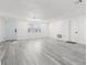 Updated living area features new floors, paint, and recessed lighting in a well lit space at 3139 Elkridge Dr, Holiday, FL 34691