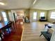 Inviting living room featuring hardwood floors and lots of natural light at 34461 Cactus Dr, Pinellas Park, FL 33781