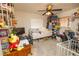 Bedroom with an office area, small bed, and whimsical decor at 35109 Excalibur, Webster, FL 33597