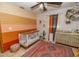 Bedroom with crib, changing table, and colorful wall decor at 35109 Excalibur, Webster, FL 33597
