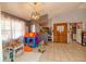 Bright living room with tile flooring and natural light, creating a welcoming atmosphere at 35109 Excalibur, Webster, FL 33597