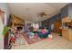 Inviting living room with stone fireplace, tile floors, and bright decor at 35109 Excalibur, Webster, FL 33597