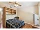 Bedroom with hardwood floors, a window view, and minimalist decor at 422 Dunedin Cir, Temple Terrace, FL 33617