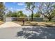 Charming single-story home with a brick accent, well-manicured lawn and attached garage at 422 Dunedin Cir, Temple Terrace, FL 33617