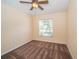 Comfortable bedroom with carpet floor and ceiling fan at 4235 Angelica Loop, Wesley Chapel, FL 33543