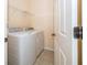 Well-equipped laundry room with modern washer and dryer at 4235 Angelica Loop, Wesley Chapel, FL 33543