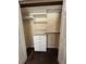 Walk-in closet offering custom shelving, drawers, and a hanging rod for organization at 4235 Angelica Loop, Wesley Chapel, FL 33543