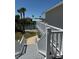 Scenic backyard featuring a waterfront view, lush landscaping, and a private staircase at 4275 Bellaire Dr, Hernando Beach, FL 34607
