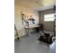Well-lit garage with an organized pegboard wall, workbench, and various tools at 4275 Bellaire Dr, Hernando Beach, FL 34607