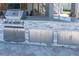 Outdoor kitchen equipped with a stainless steel grill, counter space, and storage at 4275 Bellaire Dr, Hernando Beach, FL 34607