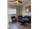 Relaxing screened-in patio with comfortable wicker furniture, great for enjoying outdoors at 4275 Bellaire Dr, Hernando Beach, FL 34607