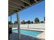 A refreshing swimming pool with a clear blue surface for relaxing and enjoying the sunny outdoors at 4275 Bellaire Dr, Hernando Beach, FL 34607