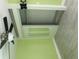 Bedroom with a ceiling fan, stylish flooring, and a closet with sliding doors at 4503 W Minnehaha St, Tampa, FL 33614