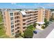 Stunning condo building with balconies, parking, and lush landscaping, perfect for enjoying the outdoors at 4550 Pinebrook Cir # 505, Bradenton, FL 34209