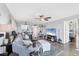 Stylish living room boasting a spacious layout, comfortable sofa, and adjacent dining area for entertaining at 4550 Pinebrook Cir # 505, Bradenton, FL 34209