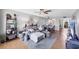 Inviting living area with an open floor plan, plush seating, and adjacent dining area, ideal for modern living at 4550 Pinebrook Cir # 505, Bradenton, FL 34209
