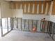 Kitchen features exposed block walls and open space for renovation at 4715 Bay Ne St # 119, St Petersburg, FL 33703