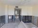 Room with exposed framing during renovation, revealing concrete block walls and electrical wiring at 4715 Bay Ne St # 119, St Petersburg, FL 33703