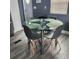 Modern dining area with a glass table and contemporary chairs at 5830 Portsmouth Dr, Tampa, FL 33615