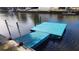Beautiful blue boat dock ready for a boat and some fun on the water at 5830 Portsmouth Dr, Tampa, FL 33615