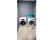 Compact laundry room with a white washer and dryer set at 5830 Portsmouth Dr, Tampa, FL 33615