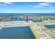 Aerial view of a residential area showing the property's location near lakes and amenities at 636 Sunlit Coral St, Ruskin, FL 33570