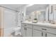 Bathroom featuring a double vanity, white cabinets, and a tub/shower combo for a clean and functional space at 636 Sunlit Coral St, Ruskin, FL 33570