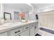 Bathroom showcasing a double vanity with elegant countertops and stylish fixtures at 636 Sunlit Coral St, Ruskin, FL 33570