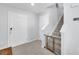 Foyer with tiled floor, staircase, and neutral paint provides a welcoming entrance at 636 Sunlit Coral St, Ruskin, FL 33570