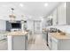 Spacious kitchen has stainless appliances, granite countertops, and ample cabinet space at 636 Sunlit Coral St, Ruskin, FL 33570