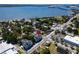 A beautiful aerial view of a waterfront property, surrounded by lush greenery and stunning water views at 718 S 22Nd St, Tampa, FL 33605
