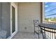 Side view of the cozy balcony with seating area at 718 S 22Nd St, Tampa, FL 33605