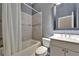 Bathroom with a tub and shower, vanity, and a neutral color scheme at 718 S 22Nd St, Tampa, FL 33605