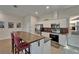 Bright kitchen with a wooden countertop island, stainless steel appliances, and backsplash at 718 S 22Nd St, Tampa, FL 33605