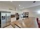 Modern kitchen featuring stainless steel appliances, light wood countertops, and stylish white cabinetry at 718 S 22Nd St, Tampa, FL 33605