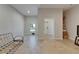 Bright living room with tile floors, ample natural light, and neutral color scheme create a welcoming space at 718 S 22Nd St, Tampa, FL 33605