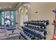 Weight rack with a variety of dumbbells and exercise equipment in the community gym at 8125 Stone Path Way, Tampa, FL 33647