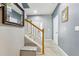Entryway featuring neutral paint and tile floors leading to the staircase at 8125 Stone Path Way, Tampa, FL 33647