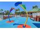 Fun splash pad area with colorful water features for in the community at 8125 Stone Path Way, Tampa, FL 33647