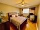 Bedroom with wood flooring and desk at 825 S Village N Dr # 201, St Petersburg, FL 33716