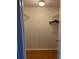 A walk-in closet with wooden floors and shelving ready for storage at 825 S Village N Dr # 201, St Petersburg, FL 33716