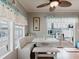 Charming breakfast nook with booth seating and large windows offering scenic views of the lake at 8444 Fantasia Park Way, Riverview, FL 33578