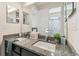 Bright bathroom featuring a double vanity with granite countertop and a large mirror at 8628 Eagle Brook Dr, Land O Lakes, FL 34638