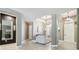 Elegant entryway featuring high ceilings, stylish lighting, and neutral tones at 8628 Eagle Brook Dr, Land O Lakes, FL 34638