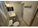 Cozy bathroom with nautical decor, featuring a modern vanity and a welcome sign at 9618 N 13Th St, Tampa, FL 33612